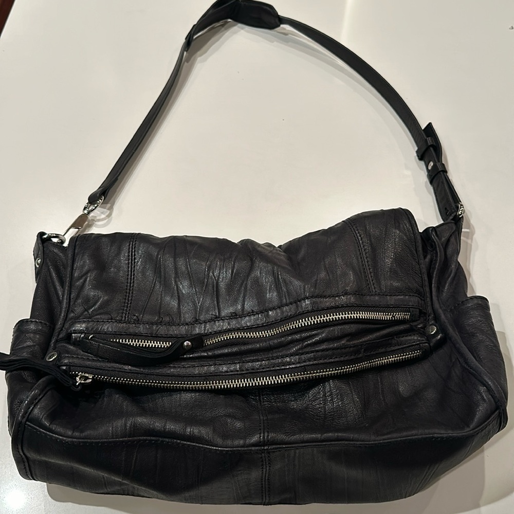 Black kearher shoulder bag by Trouvé